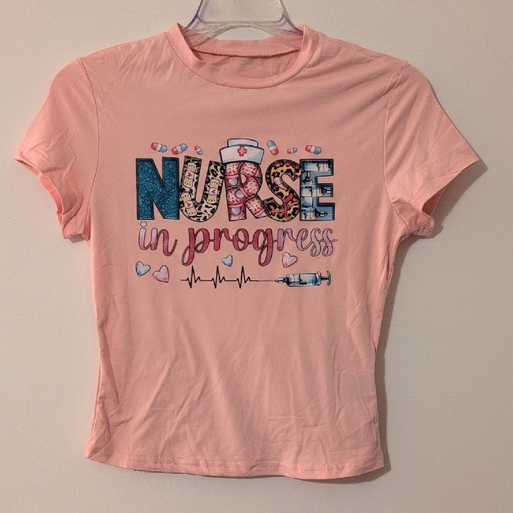 Women's Pink 'Nurse in Progress' Graphic Baby Tee